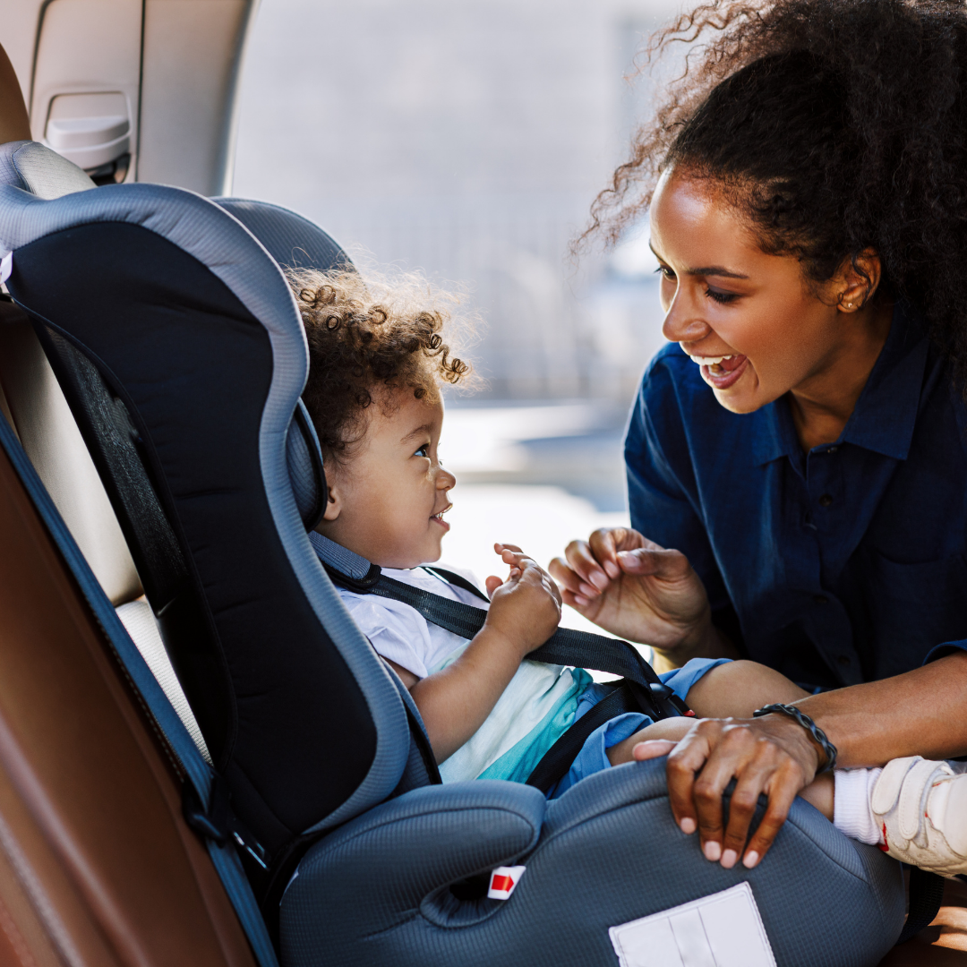 Nanny caring for baby — Baby Space makes drop-offs and pickups easier for everyone in the family, including caregivers.