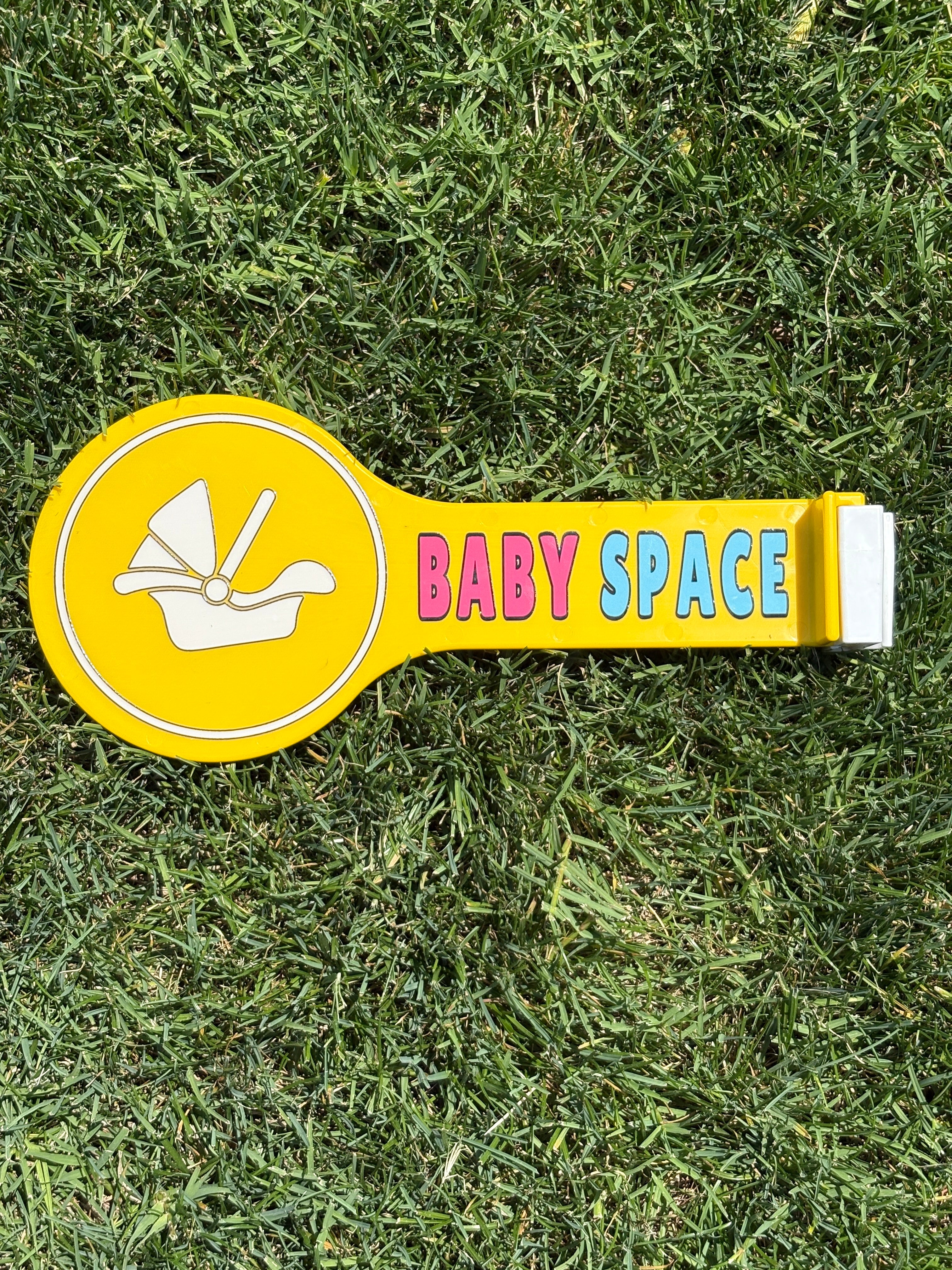 Bright yellow Baby Space car sign for parents and family.