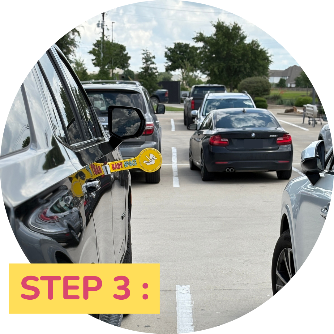 Step three: Baby is safely loaded into the car seat with extra parking space, thanks to the Baby Space parking sign.